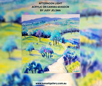 Afternoon Light by Judy Jelsma, acrylic landscape painting featuring rolling green hills, winding country tracks and expressive blue and purple trees.