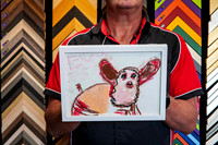 Kids artwork featuring a colourful hand-drawn animal, professionally custom framed in a simple white frame in Port Macquarie.