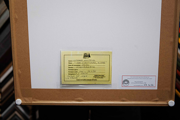 Reverse of framed Luciana Nespeca etching showing original gallery certificate and artwork documentation retained with the custom frame.