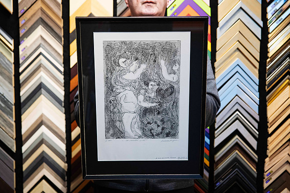 Intricate black and white figurative etching custom framed with a deep black mount and slim black timber frame in Port Macquarie.