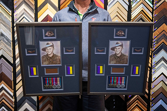 Matching custom military memorabilia frames displaying service photographs, medals, badges, insignia and uniform patches by Sunset Framing & Gallery Port Macquarie.