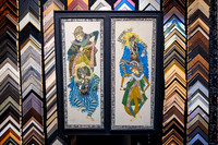 Pair of detailed textile artworks displayed together in a custom black timber frame by Sunset Framing & Gallery Port Macquarie.