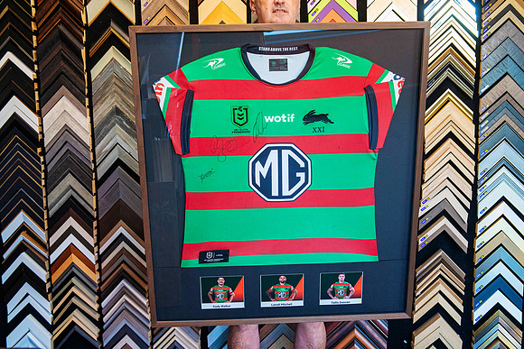 Signed South Sydney Rabbitohs NRL jersey with Cody Walker, Latrell Mitchell and Tallis Duncan player cards, professionally custom framed in Port Macquarie.