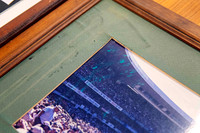 Older timber picture frame with water-damaged and aged green matting brought to Sunset Framing & Gallery for professional frame repair in Port Macquarie.