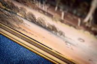Vintage artwork in an aged gold timber frame brought to Sunset Framing & Gallery for professional frame repair and refreshing in Port Macquarie.