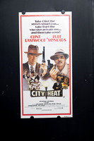Original 1984 City Heat Australian daybill movie poster featuring illustrated Clint Eastwood and Burt Reynolds with guns and 1930s crime artwork.