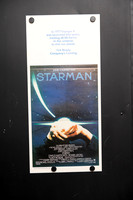 Original 1984 Starman Australian daybill movie poster featuring glowing hands beneath a star-filled sky, directed by John Carpenter and starring Jeff Bridges and Karen Allen.