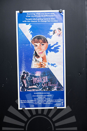 Original 1986 Peggy Sue Got Married Australian daybill movie poster featuring Kathleen Turner in a keyhole design, starring Nicolas Cage and directed by Francis Ford Coppola.