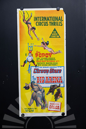 Original Australian Daybill movie poster for The Big Arena featuring colourful vintage circus artwork with trapeze artists, Oleg Popov the clown, an elephant and performing bears on a bright yellow ba