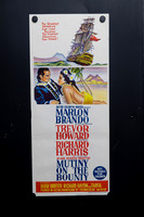 Original 1962 Australian Daybill for Mutiny on the Bounty starring Marlon Brando, Trevor Howard and Richard Harris, featuring HMS Bounty and colourful Tahitian artwork.