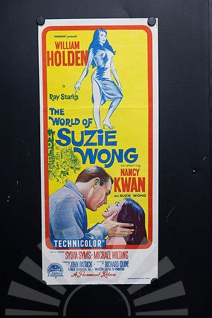 Original 1960 Australian Daybill for The World of Suzie Wong starring William Holden and Nancy Kwan, featuring vivid yellow red and blue illustrated Hong Kong artwork.