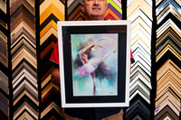 Expressive ballet dancer artwork in soft pink, aqua and pastel tones, custom framed with a wide black mat and contemporary white frame in Port Macquarie.