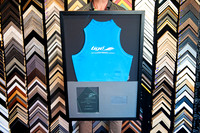 Blue 2004 Australian Wakeboard Nationals champion singlet custom framed with trophy and personalised plaque in a black sports memorabilia frame in Port Macquarie.