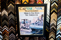 Vintage Caterpillar CAT 931C and 935C track loader advertising poster custom framed in a simple black frame by Sunset Framing & Gallery Port Macquarie.
