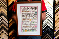 Marriage-themed handmade cross stitch custom framed with a white mat, pink accent and warm timber picture frame by Sunset Framing & Gallery in Port Macquarie.