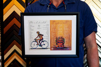 Two illustrated travel mementos displayed side by side in a black custom frame with white surround, framed in Port Macquarie.