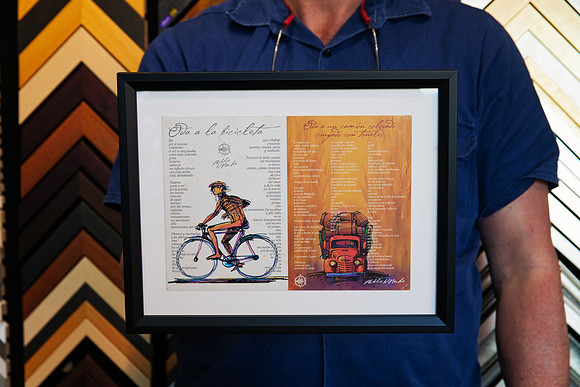 Two illustrated travel mementos displayed side by side in a black custom frame with white surround, framed in Port Macquarie.