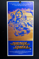 Midnite Spares Australian Daybill with blue illustrated character portraits, a modified tow truck and an airborne car on orange, above an automotive-style title.