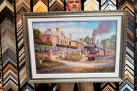 Steam train artwork professionally custom framed with white surrounds and ornate silver frame in Port Macquarie.