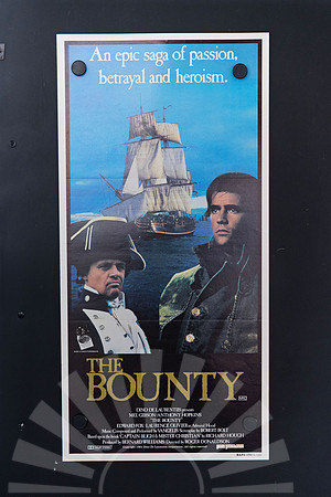 The Bounty Australian Daybill featuring a sailing ship on a blue ocean behind portraits of Anthony Hopkins in a naval hat and Mel Gibson, with a large gold title below.
