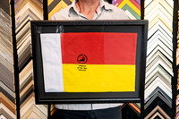 Camden Haven Lifesaver of the Year 2025/26 flag custom framed in black.