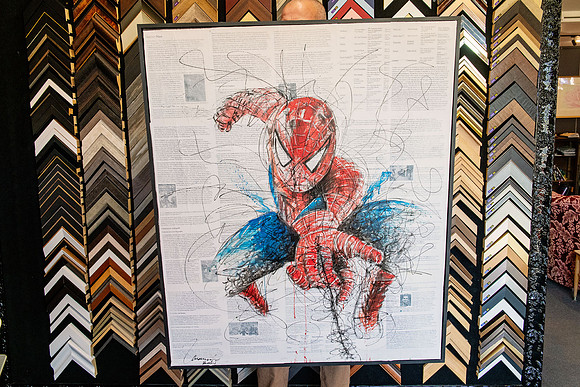 Large Spider-Man graphic artwork professionally custom framed in a slim black frame.