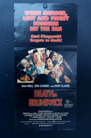 Death in Brunswick Australian Daybill with red and yellow lettering on black above a fan-shaped montage of film scenes featuring Sam Neill, Zoe Carides and John Clarke.