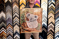 Original koala painting finished in a slim natural timber float-style frame.
