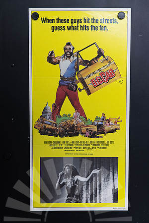 D.C. Cab Australian Daybill with Mr. T holding a yellow taxi door above illustrated taxis and characters, plus a black-and-white photograph of a female singer below.