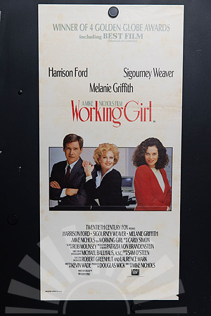Working Girl Australian Daybill with a red title above Harrison Ford, Melanie Griffith and Sigourney Weaver in office attire, and a four Golden Globe wins announcement on a light background.