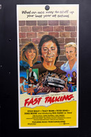 Fast Talking Australian Daybill with illustrated teenage characters against a brick wall, a car bursting through bricks, and a red title above yellow credits.