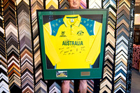 Signed Australian cricket shirt custom framed with team photograph and plaque.