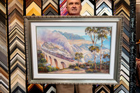 Large steam train and viaduct artwork professionally custom framed with an ornate silver frame in Port Macquarie.