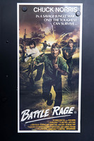 Battle Rage Australian Daybill showing an illustrated Chuck Norris carrying a gun through a jungle battle, with armed men and a yellow explosion behind him.