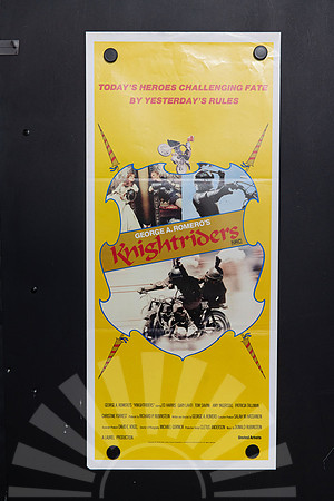 Knightriders Australian Daybill with armoured motorcyclists and character photographs inside a blue-outlined shield, striped lances and a red title on bright yellow.