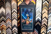 Star Wars Return of the Jedi movie poster custom framed in a dark frame and mat.