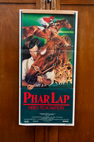 Original vintage Phar Lap Australian movie poster featuring racehorse and jockey artwork with bold red Phar Lap title.