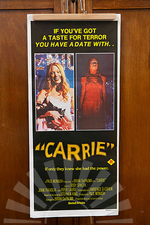 Original vintage Carrie Australian movie poster with dark illustrated horror artwork and yellow Carrie title lettering.