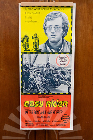 Original vintage Easy Rider Australian movie poster featuring Peter Fonda portrait and motorcycle imagery in yellow orange and black.
